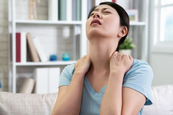 Woman Suffering From Neck and Shoulder Pain
